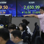 Asian stocks fell, echoing Wall Street's pullback from its rally